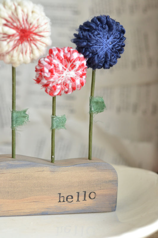 Five Patriotic Wrapped Flowers on Wood