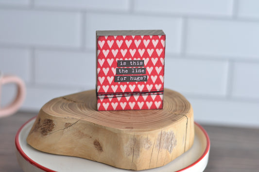 Is this the line for hugs? Red and Pink Valentines Sign