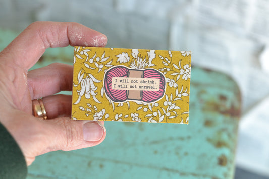 Mustard and Pink Yarn Sign