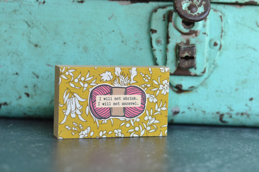 Mustard and Pink Yarn Sign