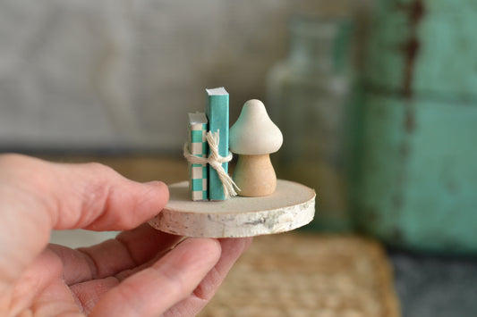 Books on a log slice